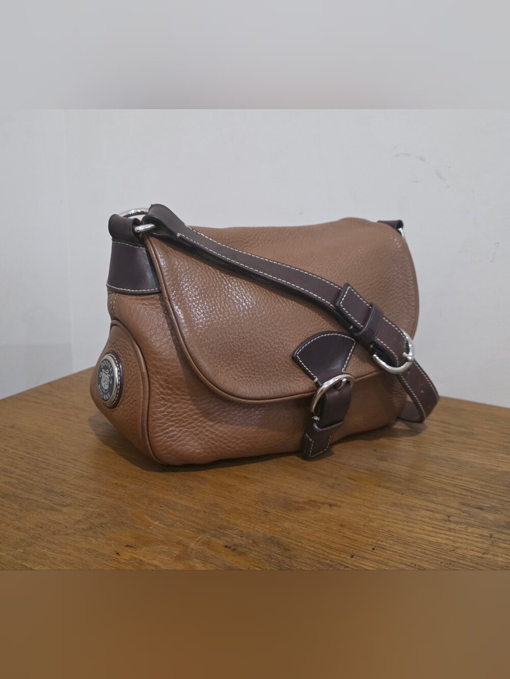 Dooney and bourke British Tan Pebbled Leather/Brown trim Crossbody bag